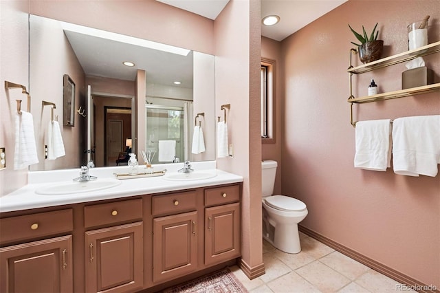 1570 Blakcomb Ct, Evergreen, CO 80439 - bathroom featuring double vanity, a shower stall, toilet, baseboards, and tile patterned floors