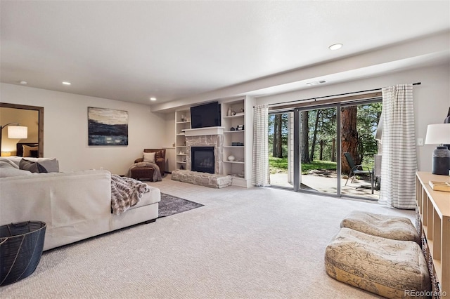 1570 Blakcomb Ct, Evergreen, CO 80439 - living area featuring recessed lighting, carpet, a fireplace, and built in shelves