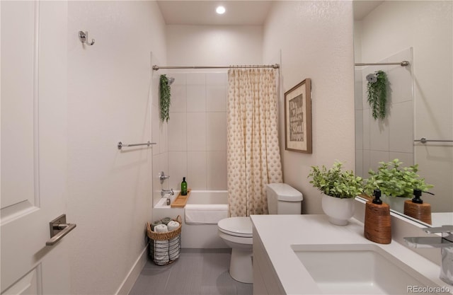 bathroom with toilet, recessed lighting, shower / bath combo, and vanity