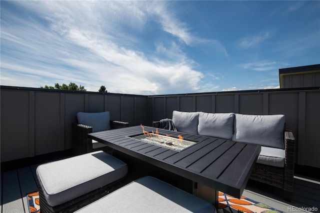 view of patio featuring a fire pit