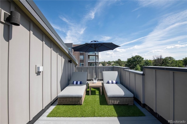 view of patio / terrace featuring a balcony