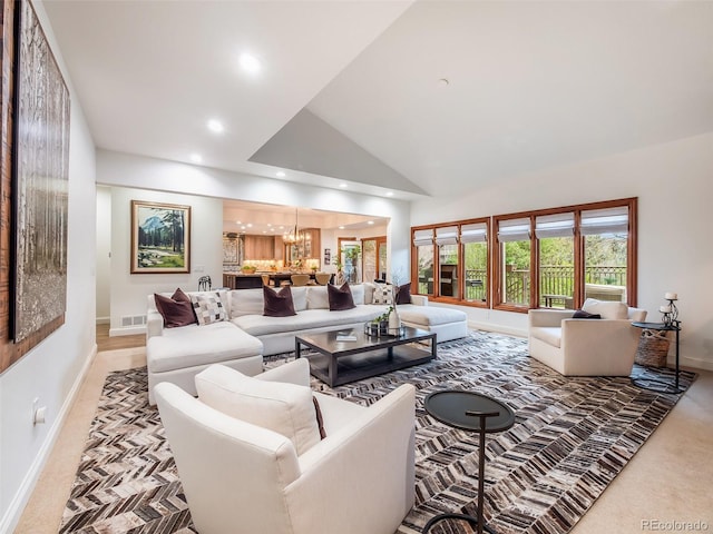 62 N Ranch Rd, Littleton, CO 80127 - carpeted living area featuring a chandelier, baseboards, recessed lighting, and lofted ceiling