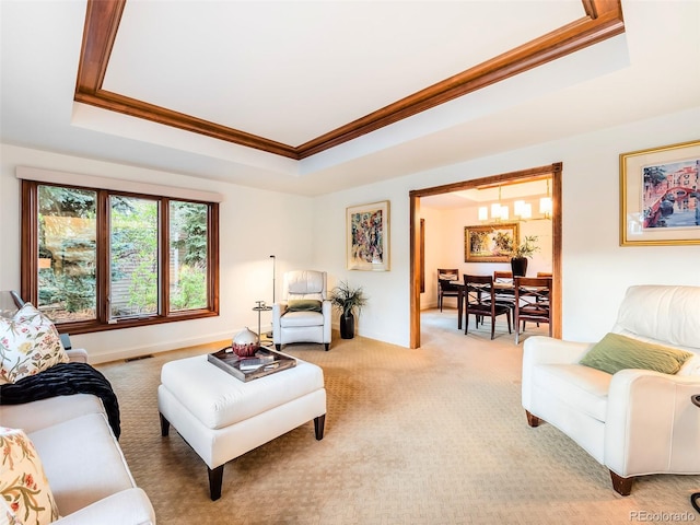 62 N Ranch Rd, Littleton, CO 80127 - living area featuring a raised ceiling, crown molding, light colored carpet, a chandelier, and baseboards