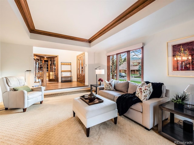 62 N Ranch Rd, Littleton, CO 80127 - living room featuring crown molding, a raised ceiling, and light colored carpet
