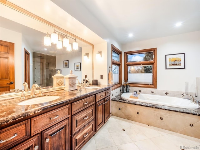 62 N Ranch Rd, Littleton, CO 80127 - full bathroom with a garden tub, a stall shower, double vanity, tile patterned floors, and recessed lighting