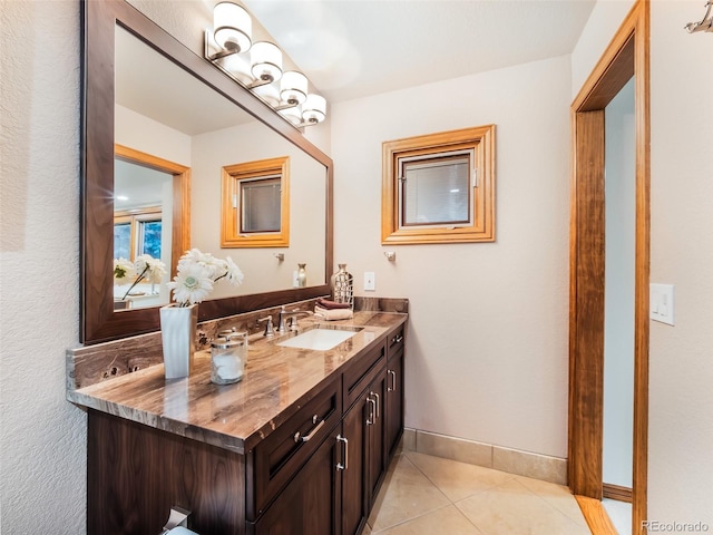 62 N Ranch Rd, Littleton, CO 80127 - bathroom featuring vanity, tile patterned flooring, and baseboards