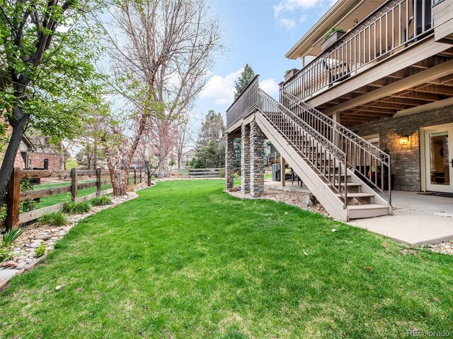 62 N Ranch Rd, Littleton, CO 80127 - view of yard featuring stairs, a patio, and a deck