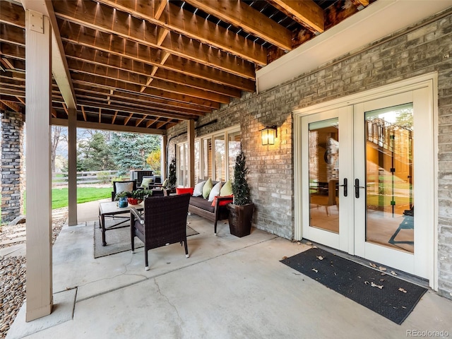 62 N Ranch Rd, Littleton, CO 80127 - view of patio featuring french doors and outdoor lounge area