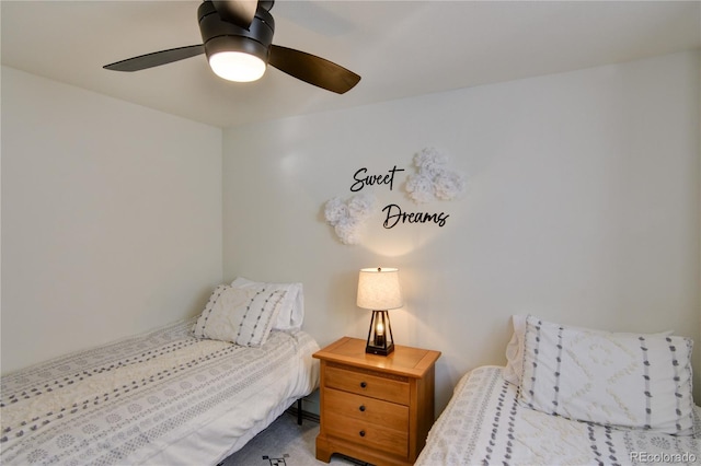 bedroom featuring ceiling fan and carpet floors