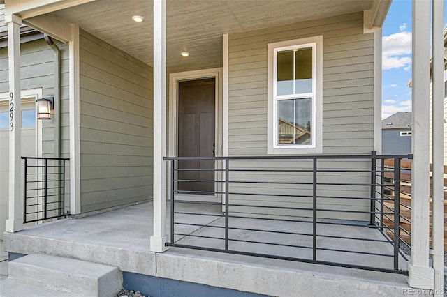 entrance to property with a porch