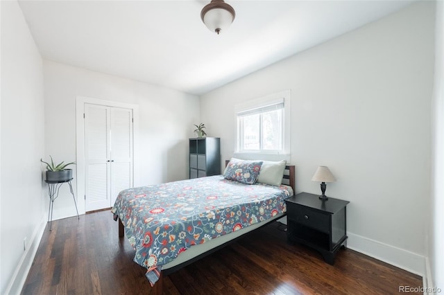 915 N Kearney St, Denver, CO 80220 - bedroom featuring baseboards, wood finished floors, and a closet