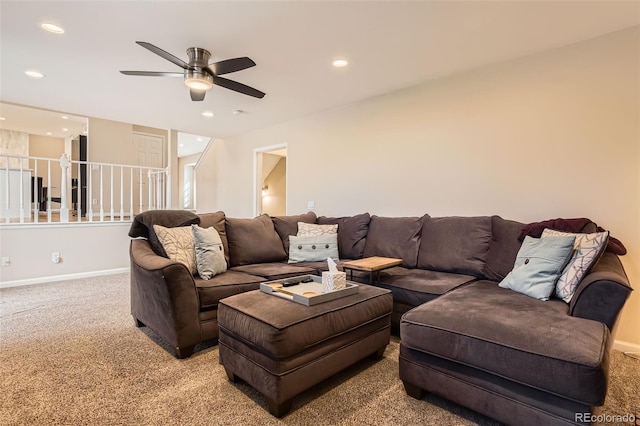 carpeted living room featuring ceiling fan, baseboards, and recessed lighting