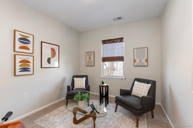 living area with carpet flooring