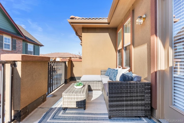 balcony featuring an outdoor living space