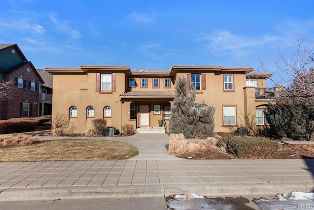 view of front of house with central AC unit