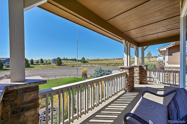 balcony featuring a porch