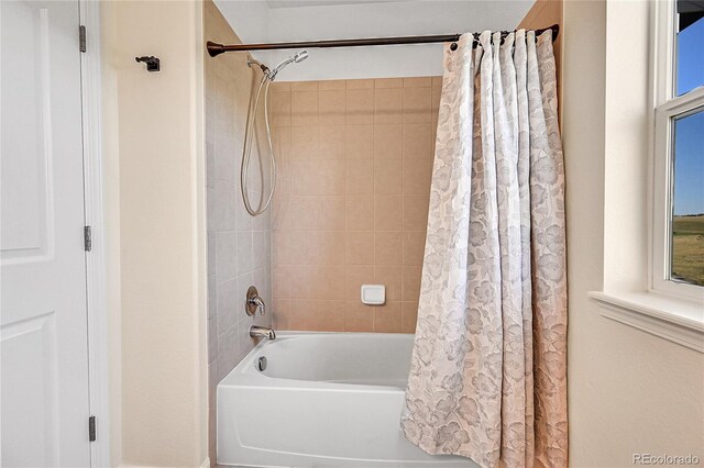 bathroom featuring shower / tub combo