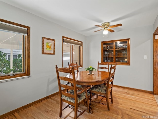 1827 S Fairfax St, Denver, CO 80222 - dining area featuring a ceiling fan and light wood finished floors