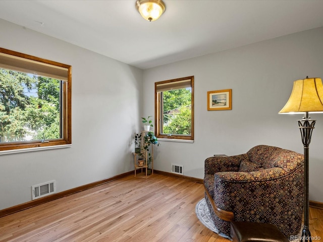 1827 S Fairfax St, Denver, CO 80222 - sitting room with light wood-style floors