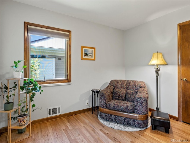 1827 S Fairfax St, Denver, CO 80222 - living area with wood finished floors and baseboards