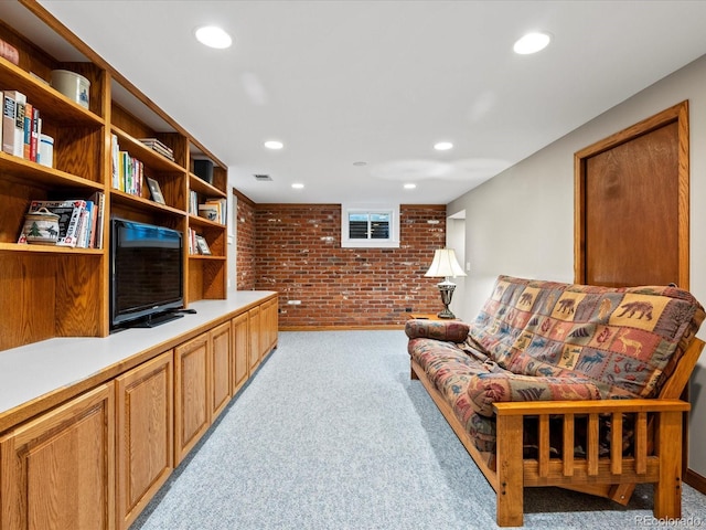 1827 S Fairfax St, Denver, CO 80222 - living area featuring brick wall, light carpet, and recessed lighting