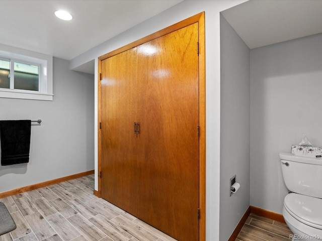 1827 S Fairfax St, Denver, CO 80222 - bathroom with wood tiled floors and recessed lighting