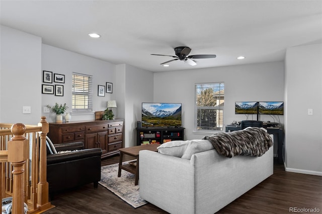 living area featuring dark wood-type flooring, a ceiling fan, a healthy amount of sunlight, and recessed lighting