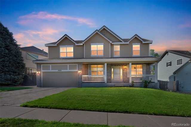 19076 E Lasalle Pl, Aurora, CO 80013 - traditional-style house with driveway, a porch, an attached garage, and brick siding