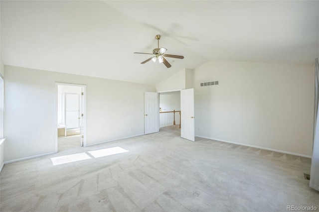 19076 E Lasalle Pl, Aurora, CO 80013 - unfurnished bedroom with light colored carpet, high vaulted ceiling, a ceiling fan, and connected bathroom