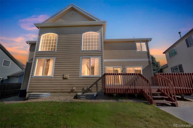 19076 E Lasalle Pl, Aurora, CO 80013 - back of house at dusk with a wooden deck