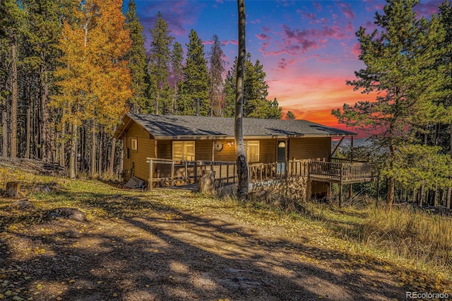 view of front of property featuring a wooden deck