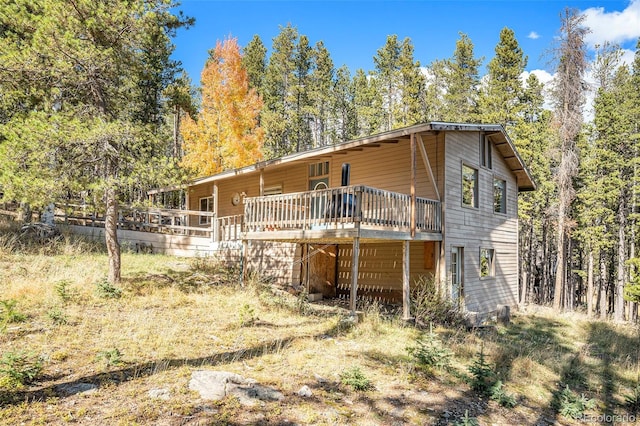 rear view of property with a deck