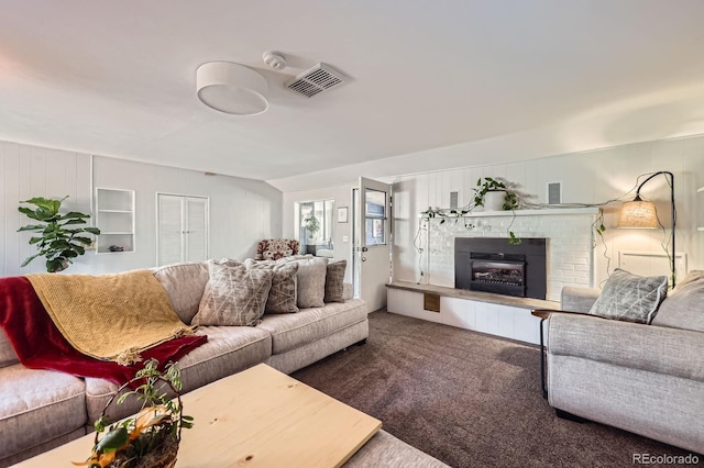6995 W 27th Ave, Wheat Ridge, CO 80033 - living area with carpet and a fireplace