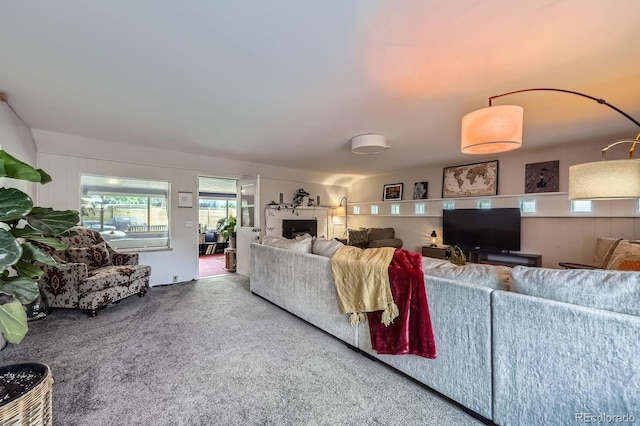 6995 W 27th Ave, Wheat Ridge, CO 80033 - living area with carpet floors and a fireplace