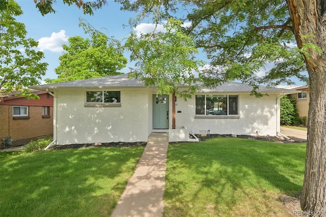 169 Yates St, Denver, CO 80219 - ranch-style house featuring brick siding, a front lawn, and roof with shingles