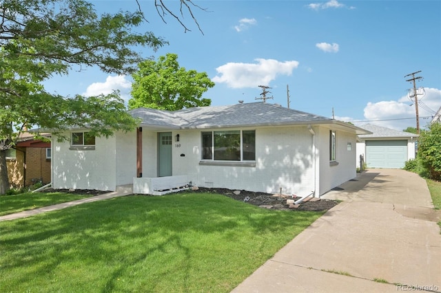 169 Yates St, Denver, CO 80219 - ranch-style home featuring concrete driveway, a front yard, and brick siding