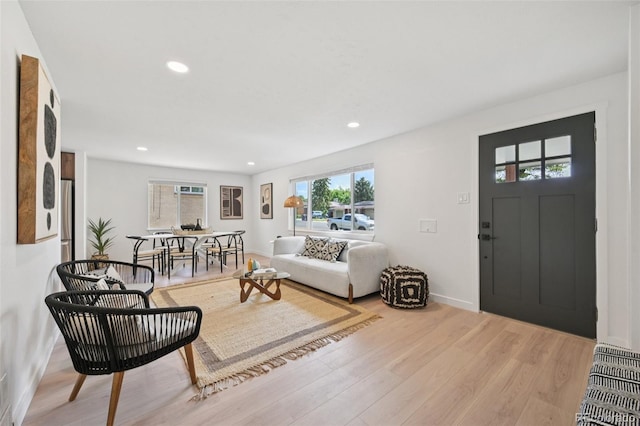 169 Yates St, Denver, CO 80219 - living room with wood finished floors and recessed lighting