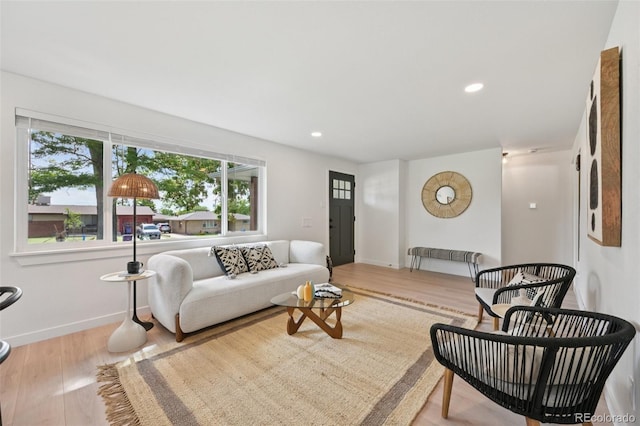 169 Yates St, Denver, CO 80219 - living area featuring wood finished floors and recessed lighting