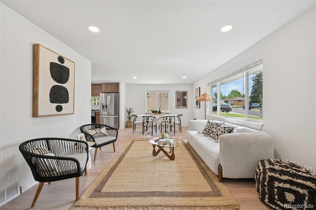 169 Yates St, Denver, CO 80219 - living room featuring recessed lighting and light wood-type flooring