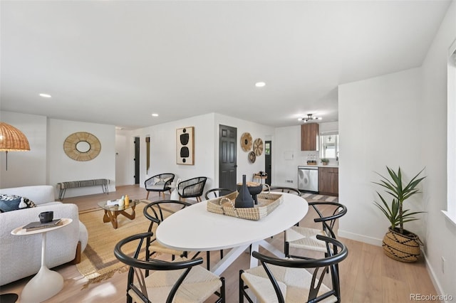 169 Yates St, Denver, CO 80219 - dining area with light wood-style flooring and recessed lighting