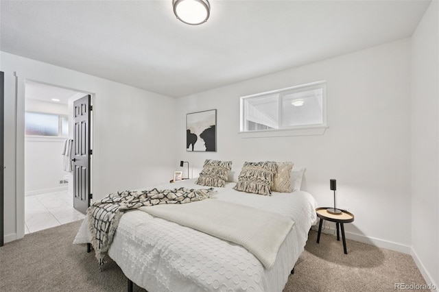 169 Yates St, Denver, CO 80219 - bedroom with light carpet and ensuite bath