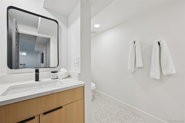 169 Yates St, Denver, CO 80219 - bathroom with vanity and toilet