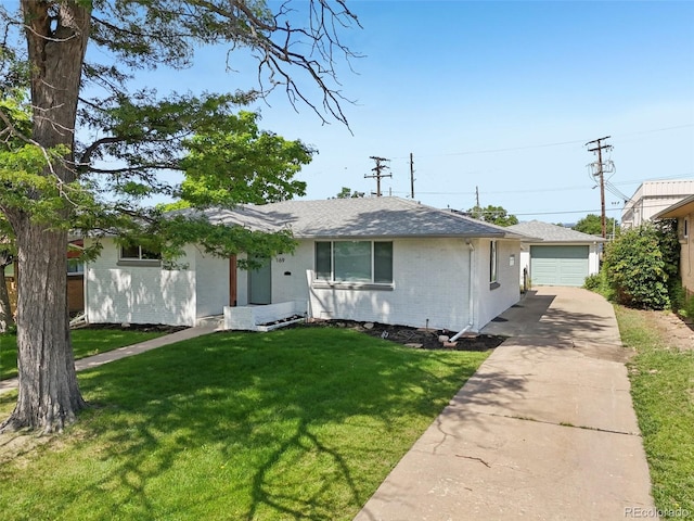 169 Yates St, Denver, CO 80219 - single story home featuring concrete driveway, a front lawn, brick siding, roof with shingles, and an attached garage
