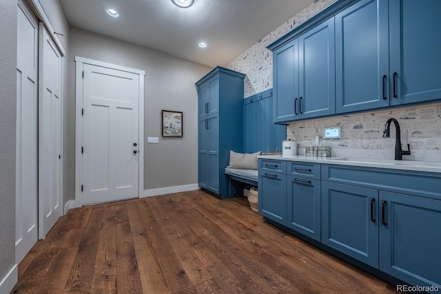 31455 Half Peak Trl, Pine, CO 80470 - washroom featuring a sink, dark wood-type flooring, recessed lighting, and baseboards
