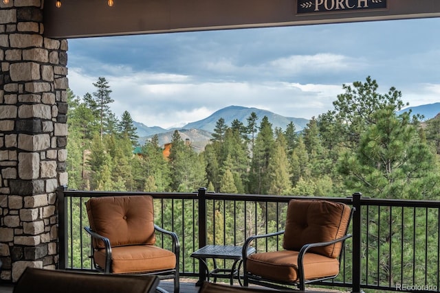 31455 Half Peak Trl, Pine, CO 80470 - balcony featuring a mountain view and a forest view