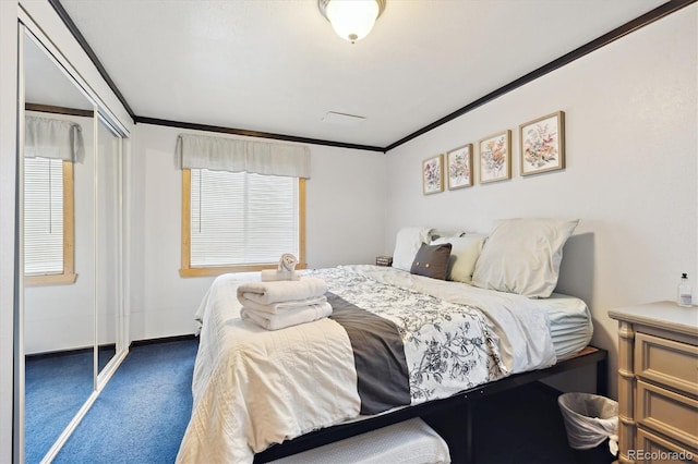 bedroom with carpet flooring, multiple windows, and ornamental molding