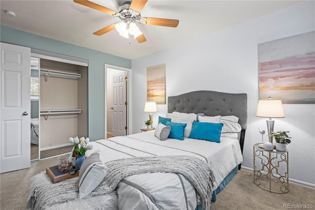 bedroom featuring ceiling fan, a closet, and carpet