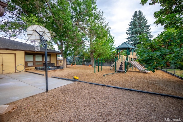 view of jungle gym with a patio area