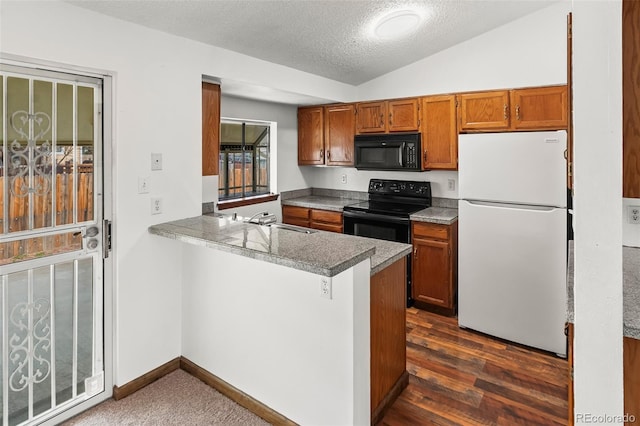12116 N Fairfax St, Thornton, CO 80241 - kitchen with lofted ceiling, a textured ceiling, brown cabinetry, a sink, and black appliances