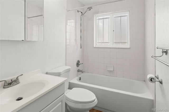 12116 N Fairfax St, Thornton, CO 80241 - bathroom with shower / bathing tub combination, vanity, toilet, and a textured wall